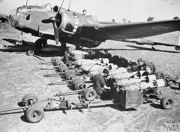 49 Sqn Hampden at Scampton 1940 armourers fitting fuses to 250 lb GP bombs